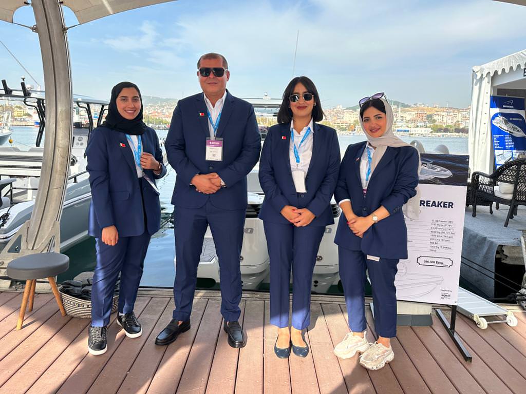 A group of four well dressed individuals at Aldhaen Marine